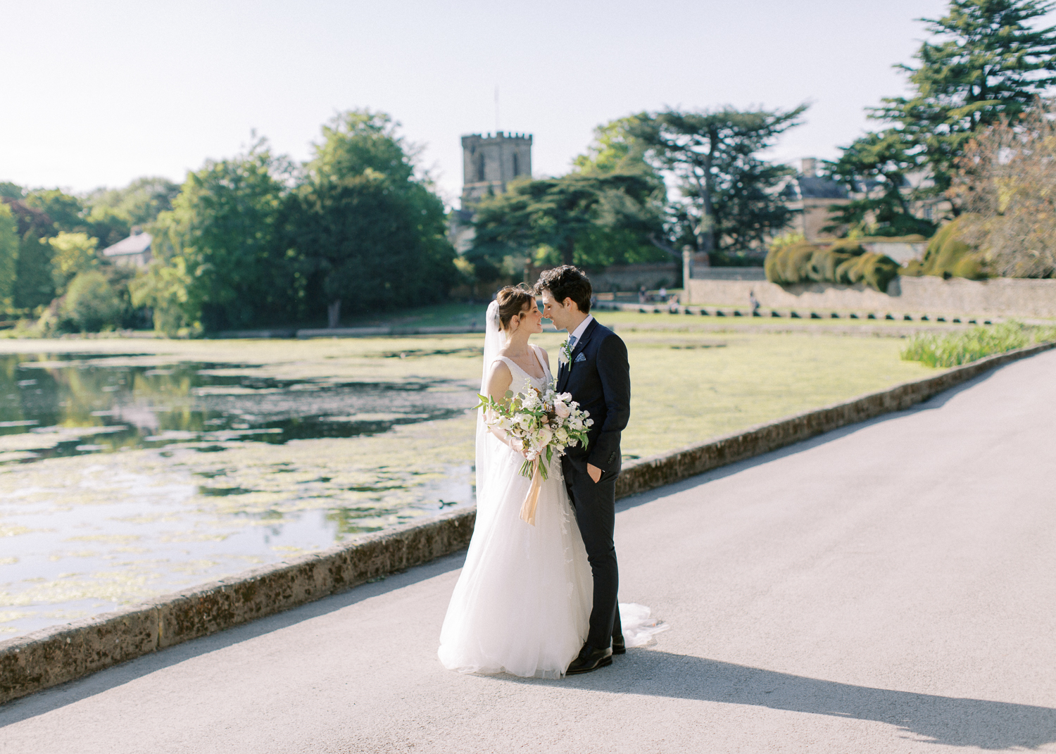 classic and romantic bride and groom portrait at Melbourne hall gardens