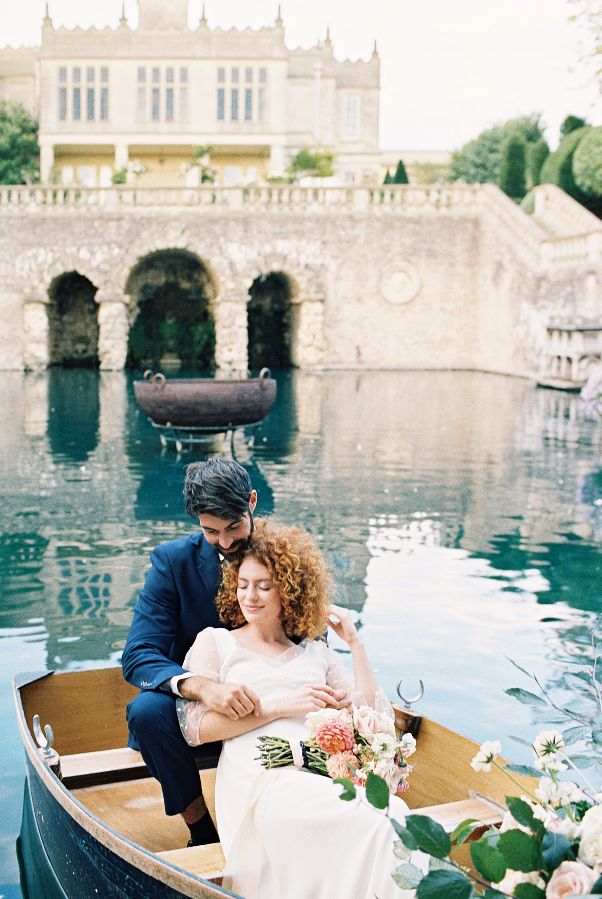 romantic bride and groom portrait in the boat