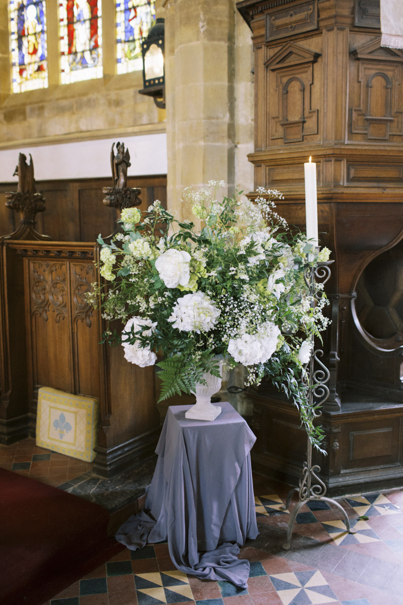 romantic white flowers arrangements at church wedding in 
