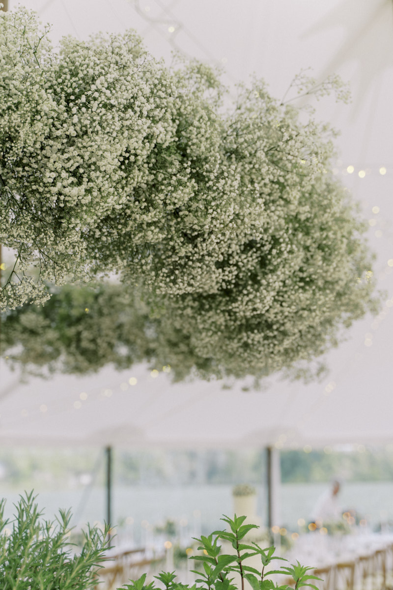 Gypsophila cloud arrangement in luxury marquee wedding 