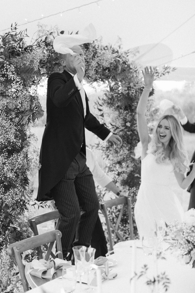 black and white photo of the bride and groom entrance