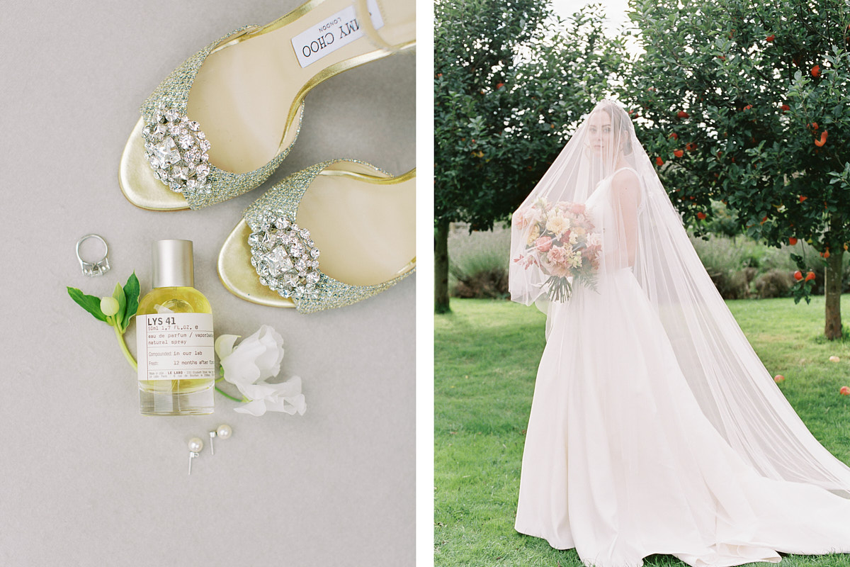 fine art bride in the garden wearing long cathedral veil and beautiful wedding heel shoes with bottle of perfume 
