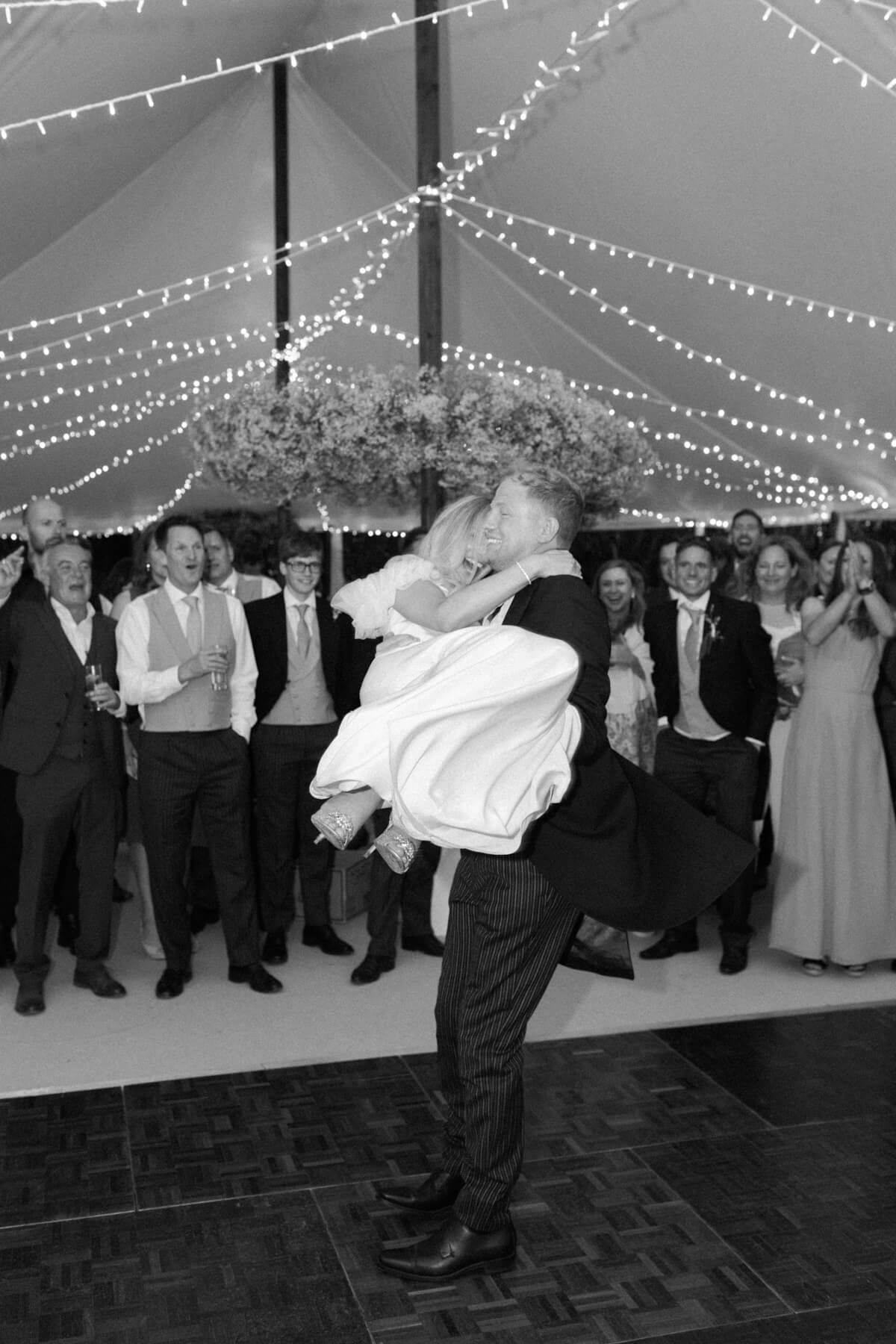 bride and groom first dance captured during the evening wedding schedule turnaround
